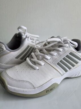 K-Swiss White Sneakers with Light Gray Stripes.